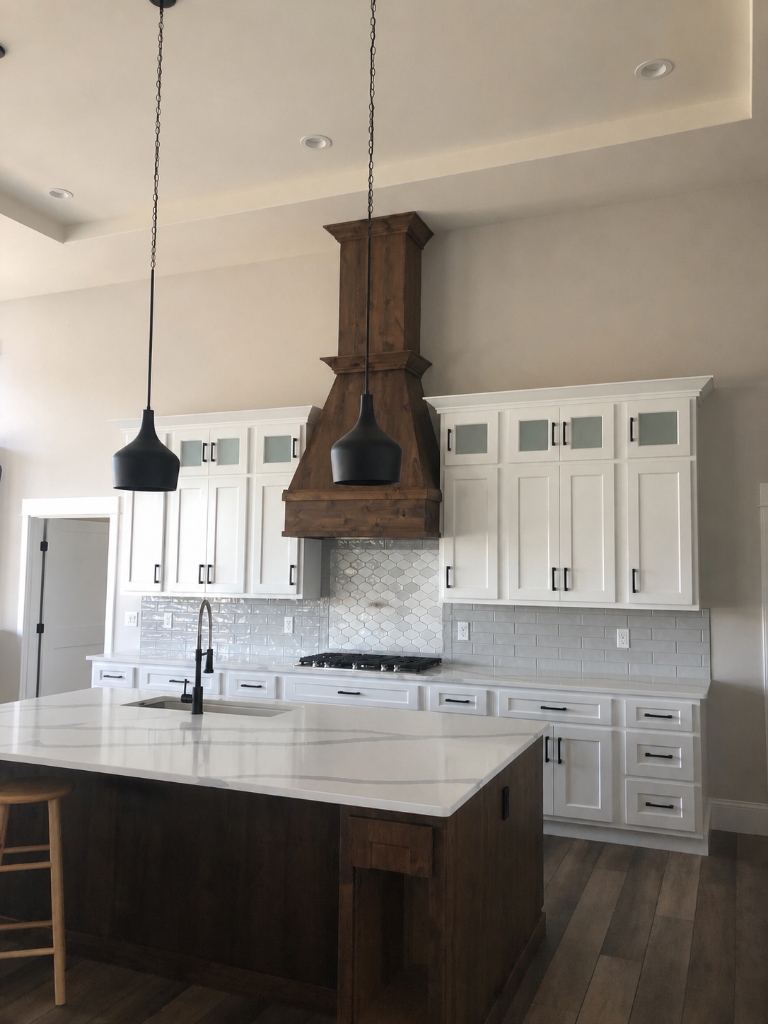 Luxury Kitchen Remodel with Custom Wood Range Hood