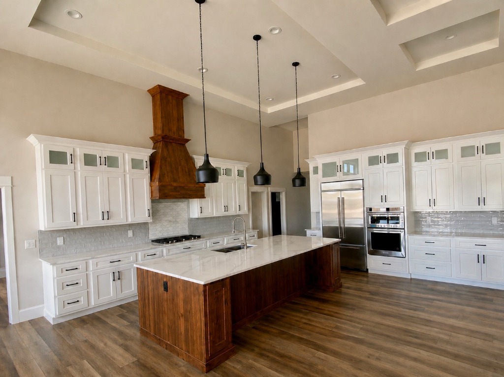 Grand Chef's Kitchen with Custom Stained Wood Island and Range Hood
