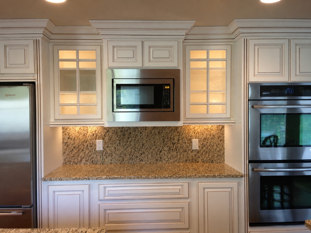 Built-In Appliance Wall Tower with Backlit Glass Display Cabinets