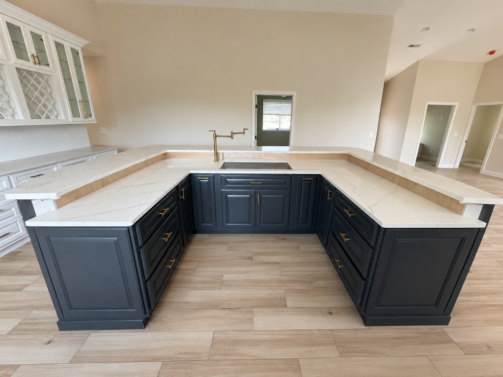 Custom U-Shaped Navy Island with Dual-Tier Quartz Countertops
